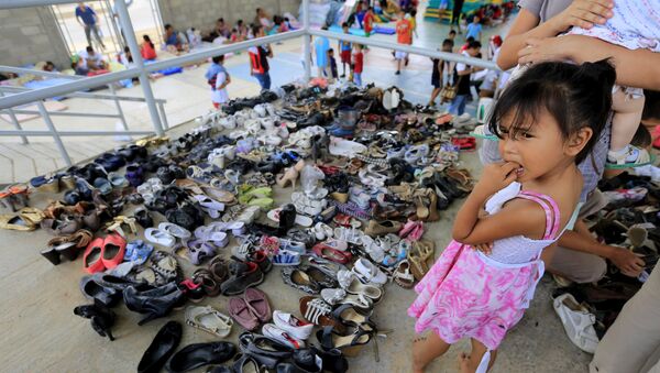 Niña colombiana en un refugio de deportados en Villa del Rosario - Sputnik Mundo