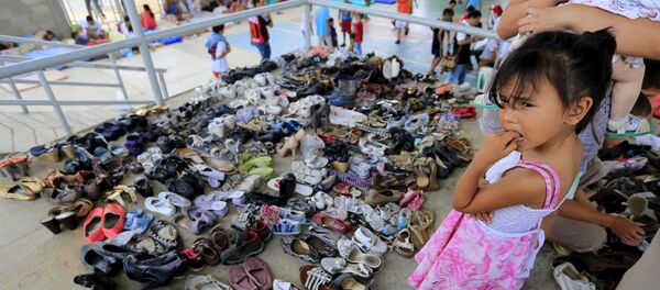 Niña colombiana en un refugio de deportados en Villa del Rosario - Sputnik Mundo