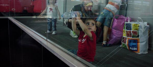 Migrantes - Sputnik Mundo