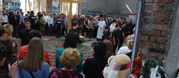 Homenaje a las víctimas del atentado terrorista en Beslán - Sputnik Mundo