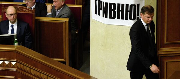 Primer ministro de Ucrania, Arseni Yatseniuk (izda.) y líder del Partido Radical de Ucrania, Oleg Liashkó (dcha.). Archivo - Sputnik Mundo