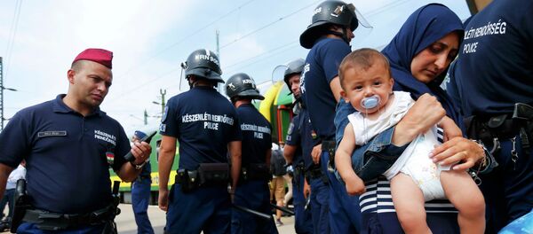 Inmigrantes en Hungría - Sputnik Mundo