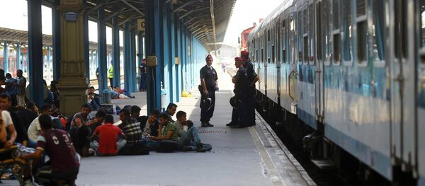 Migrantes - Sputnik Mundo