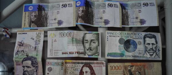 Pesos colombianos - Sputnik Mundo