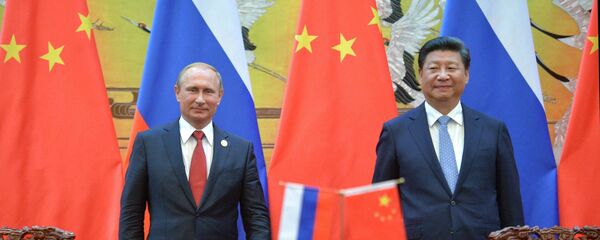Presidente de Rusia, Vladímir Putin, y presidente de China, Xi Jinping (archivo) - Sputnik Mundo