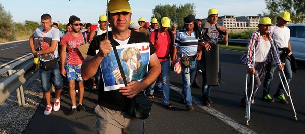 Austria y Alemania dejarán entrar a refugiados procedentes de Hungría - Sputnik Mundo