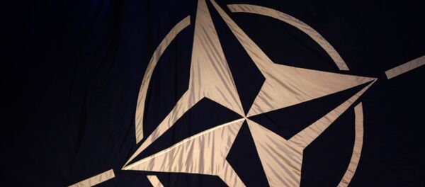 Logo de la OTAN - Sputnik Mundo