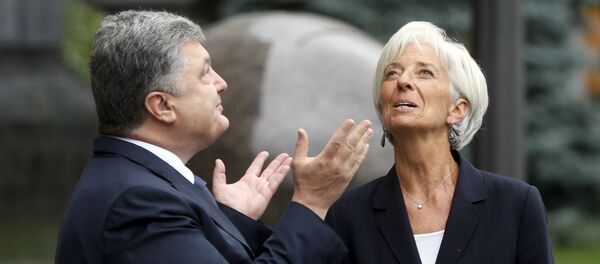 Presidente de Ucrania, Petró Poroshenko y directora del Fondo Monetario Internacional, Christine Lagarde - Sputnik Mundo