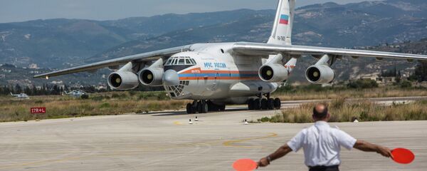 Avión ruso con ayuda humanitaria en Siria - Sputnik Mundo
