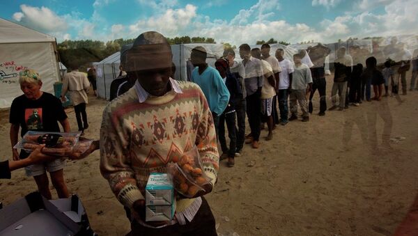 Refugiados en Francia - Sputnik Mundo