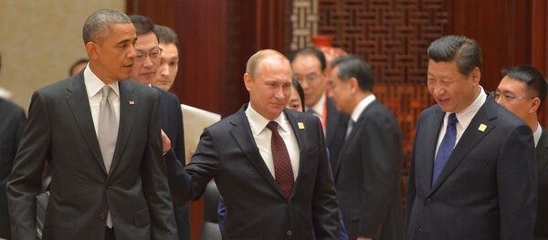 Vladímir Putin, el presidente de Rusia con sus homólogos de EEUU y China - Sputnik Mundo