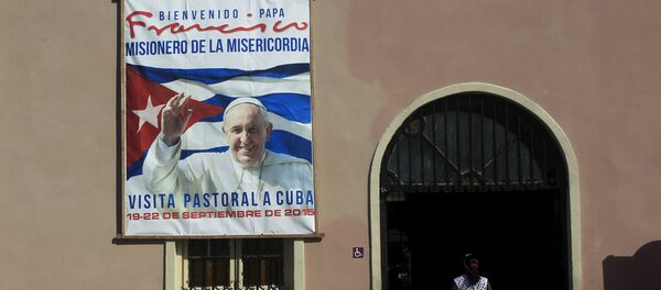 Сartel con la imagen del Papa Francisco - Sputnik Mundo