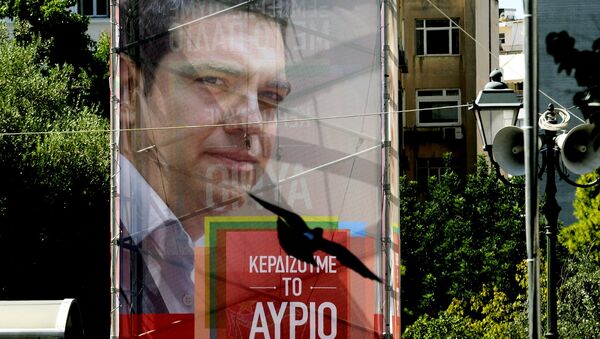 Сartel con la imagen del líder de Syriza, Alexis Tsipras - Sputnik Mundo