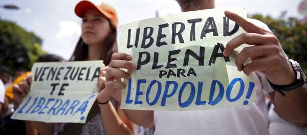 Manifestantes exigen la liberación del líder opositor Leopoldo López - Sputnik Mundo