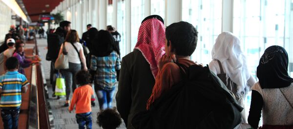 Refugiados sirios en el aeropuerto de Buenos Aires - Sputnik Mundo