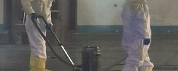 Trabajadores en el reactor nuclear norcoreano de Yongbyon (archivo) - Sputnik Mundo