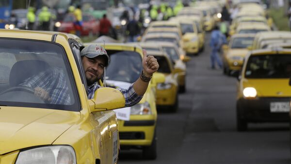 Protesta contra el servicio Uber en Bogotá, Colombia - Sputnik Mundo