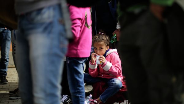 Refugiados en la estación ferroviaria Refugiados en la estación ferroviaria - Sputnik Mundo