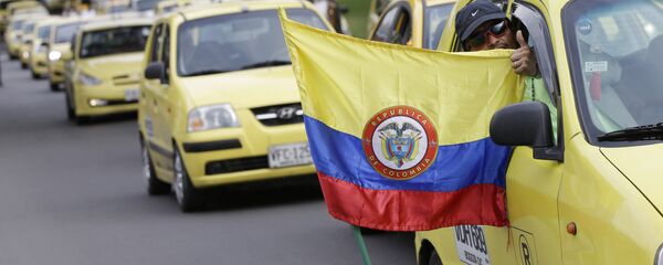 Protesta contra el servicio Uber en Bogotá, Colombia (archivo) - Sputnik Mundo