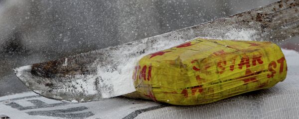 Un paquete de cocaína, foto de archivo Un paquete de cocaína, foto de archivo - Sputnik Mundo