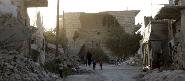 Edificios destruidos en Idlib (archivo) - Sputnik Mundo
