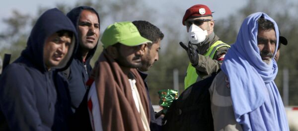 Migrantes - Sputnik Mundo