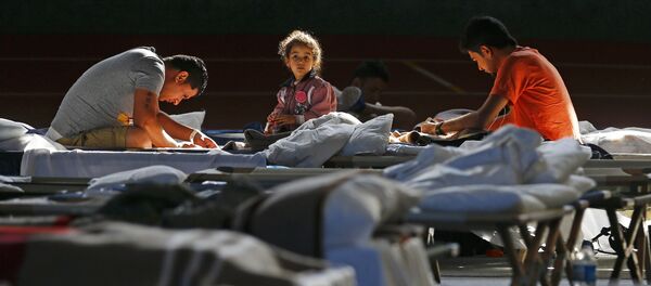 Migrantes - Sputnik Mundo