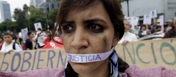 Un año de la masacre de los estudiantes de magisterio rural de Ayotzinapa. Manifestación, Ciudad de México - Sputnik Mundo
