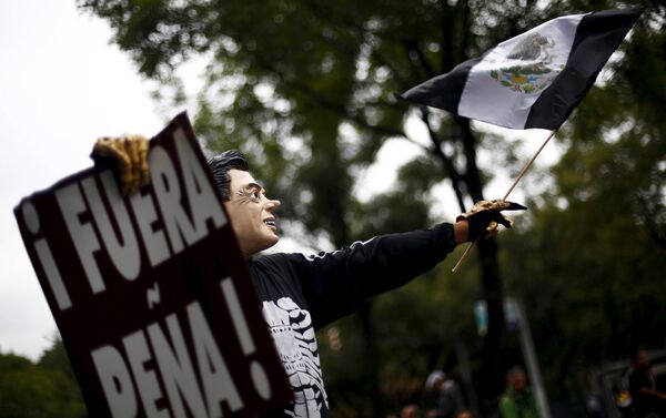 Un año de la masacre de los estudiantes de magisterio rural de Ayotzinapa. Ciudad de México - Sputnik Mundo