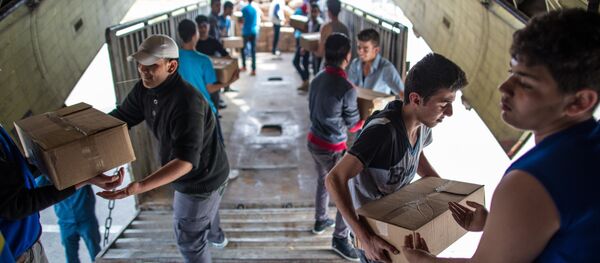 Rusia entrega la ayuda humanitaria a Siria (archivo) Rusia entrega la ayuda humanitaria a Siria (archivo) - Sputnik Mundo