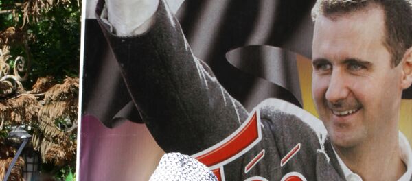 Póster de presidente de Siria, Bashar Asad en Damasco Póster de presidente de Siria, Bashar Asad en Damasco - Sputnik Mundo