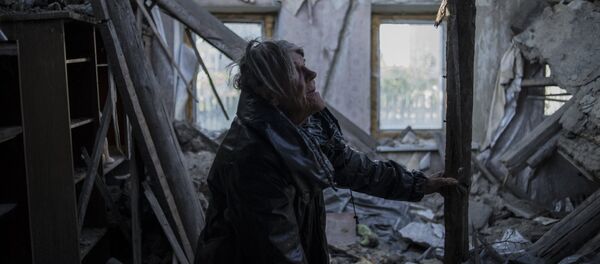 Vecino del pueblo Staromykhailivka de la región de Donetsk - Sputnik Mundo