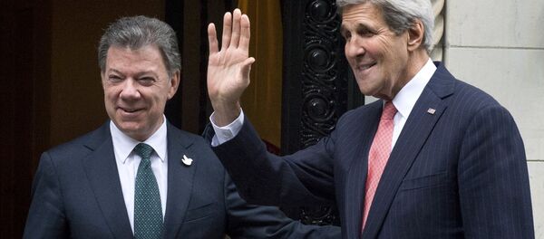 Presidente de Colombia Juan Manuel Santos y Secretario de Estado de EEUU John Kerry - Sputnik Mundo