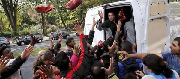 Alemania podría recibir hasta 1,5 millones de refugiados este año - Sputnik Mundo