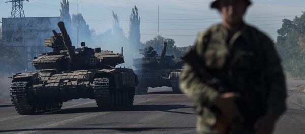 Retirada del armamento desde la línea de separación en la RPL - Sputnik Mundo