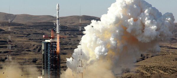 A Long March-4B rocket loaded with the CBERS-4 satellite - Sputnik Mundo