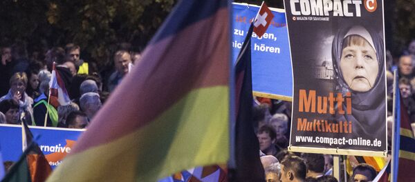 Protestas contra política migratoria alemana - Sputnik Mundo
