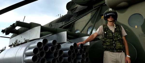 Piloto ruso en el aeródromo de Hmeymim en Siria Piloto ruso en el aeródromo de Hmeymim en Siria - Sputnik Mundo