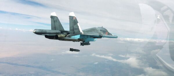 Нанесение российской боевой авиацией ударов по позициям ИГ в Сирии - Sputnik Mundo