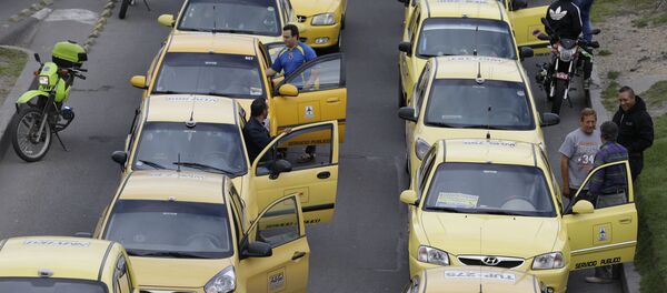Protesta contra el servicio Uber en Bogotá (archivo) Protesta contra el servicio Uber en Bogotá (archivo) - Sputnik Mundo