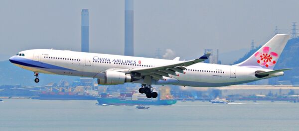 Un avión de la compañía aérea China Airlines - Sputnik Mundo