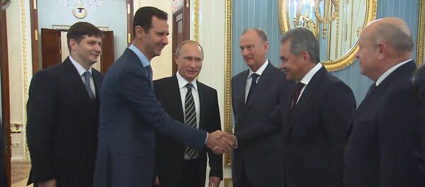 Presidentes de Rusia y Siria en una cena - Sputnik Mundo