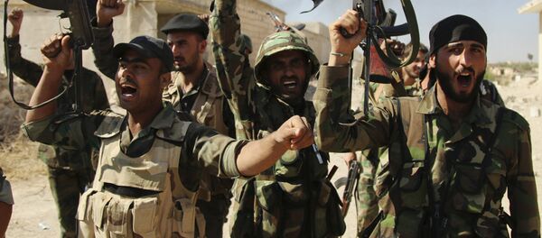 Soldados del Ejército sirio en la provincia de Hama Soldados del Ejército sirio en la provincia de Hama - Sputnik Mundo