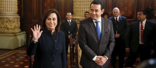 Candidatos presidenciales de Guatemala Sandra Torres y Jimmy Morales - Sputnik Mundo