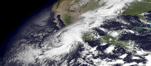 Hurricane Patricia, a category 5 storm, is seen approaching the coast of Mexico in a NOAA satellite image taken by GOES East at 10:45 ET (14:45 GMT) October 23, 2015. - Sputnik Mundo