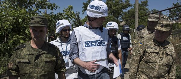 Observadores de la OSCE en Ucrania (archivo) - Sputnik Mundo