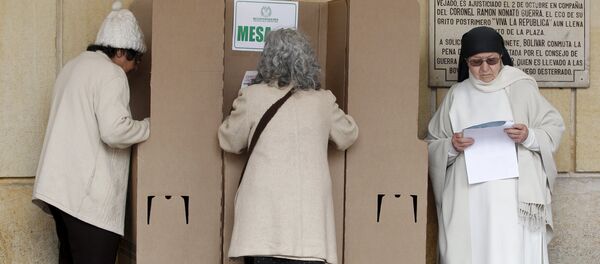 Mujeres colombianas votan en elecciones locales en Colombia - Sputnik Mundo