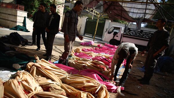 Cuerpos de las víctimas de un ataque en Damasco - Sputnik Mundo