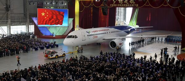 The first C919 passenger jet made by the Commercial Aircraft Corp of China (Comac) The first C919 passenger jet made by the Commercial Aircraft Corp of China (Comac) - Sputnik Mundo