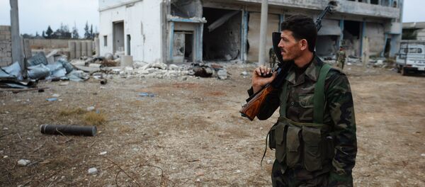 Soldado sirio en la provinvia de Homs - Sputnik Mundo